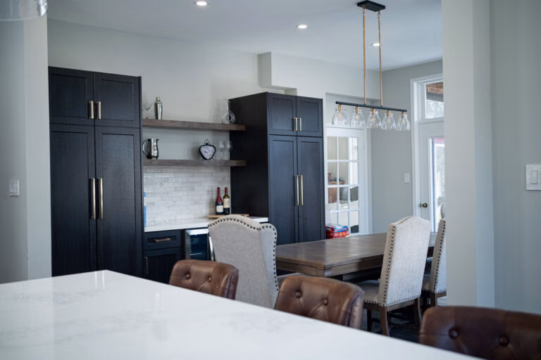 Renovated kitchen with dark cabinetry
